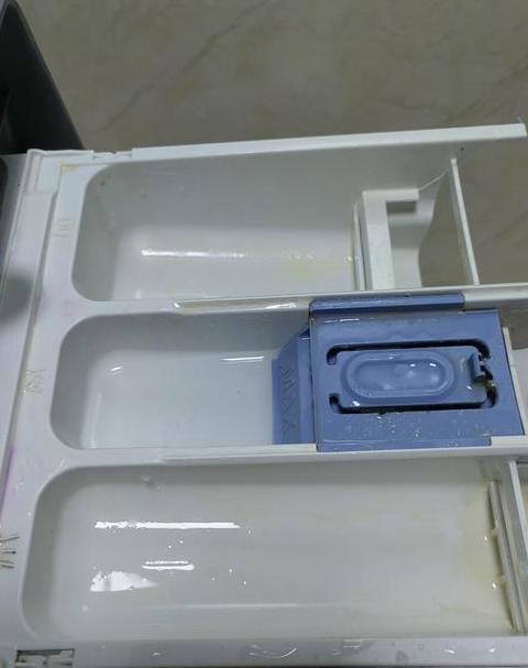 洗衣机柔顺剂盒拆卸